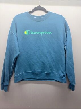 Champion Women's Teal Blue Crewneck Sweatshirt with Neon Logo